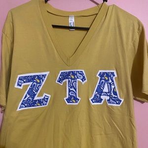 ZTA V- Neck Letters